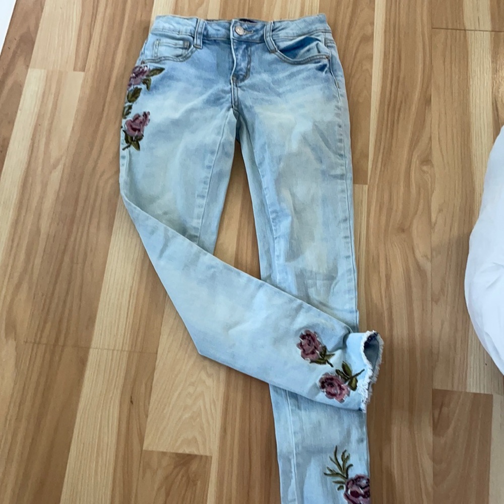 Size 10 light blue jeans with roses 🌹